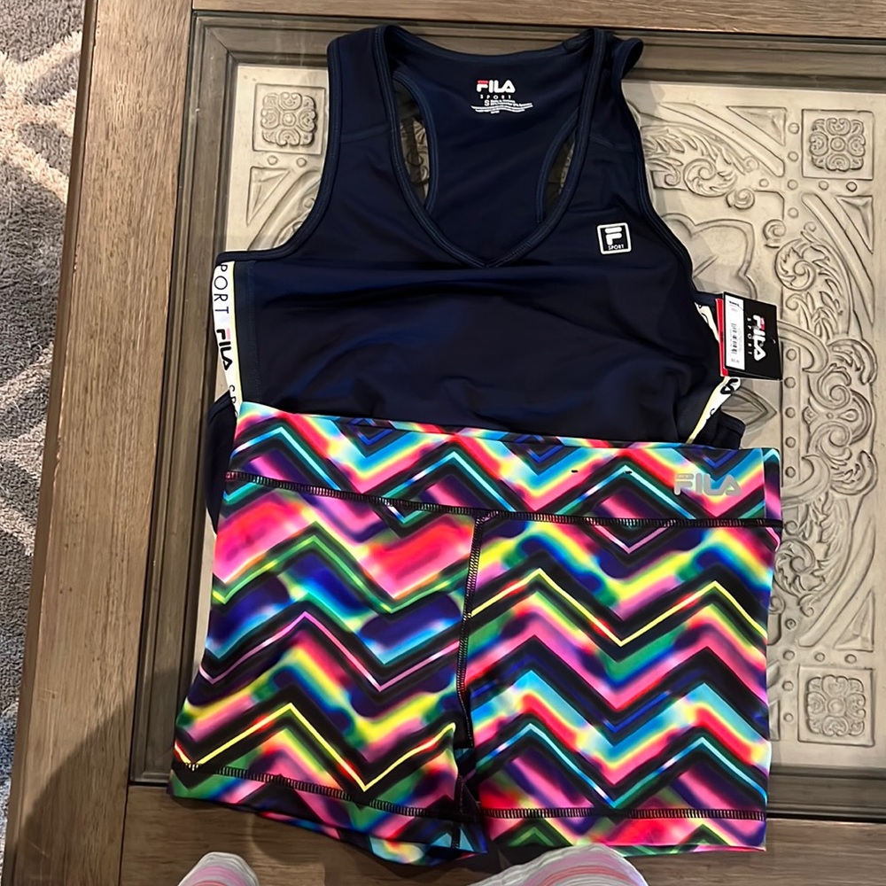 FILA two piece work out set, bought from a posher but it’s big for me.